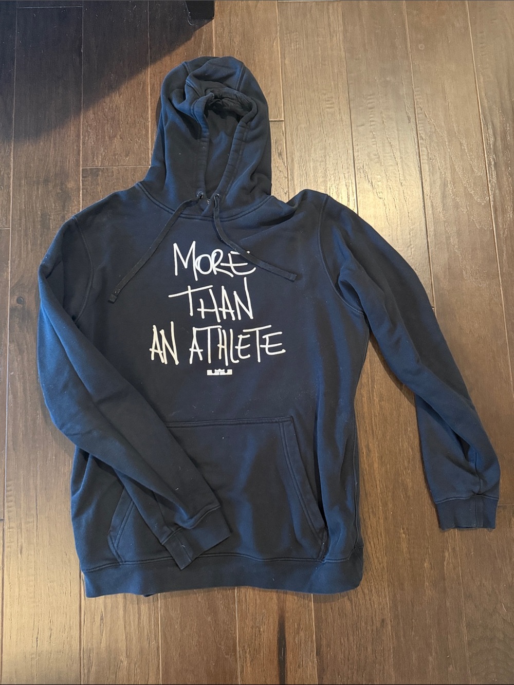 Nike Black Hoodie with White 'More Than An Athlete' Script